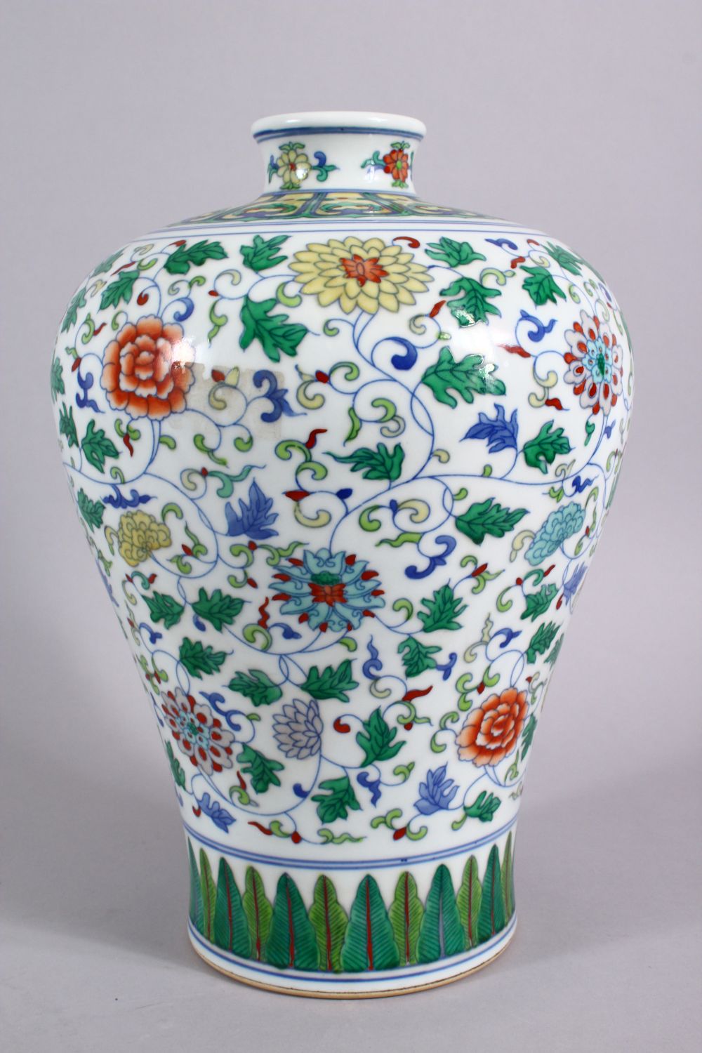 A CHINESE DOUCAI DECORATED PORCELAIN MEIPING VASE, decorated with formal scrolling lotus, and lappet - Image 3 of 9