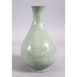 AN 18TH / 19TH CENTURY CHINESE LONGQUAN CELADON PORCELAIN VASE, with floral carved decoration,