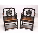 A PAIR OF 19TH CENTURY HEAVY QUALITY CHINESE CARVED HARDWOOD ARM CHAIRS, each chair with carved back