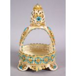 A ISLAMIC ZSLONAY OPENWORK PORCELAIN FORMED CASKET, with turquoise and gilded decoration, 20cm x