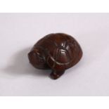 A 20TH CENTURY JAPANESE CARVED WOODEN NETSUKE OF A TORTOISE, inset signature to base, 4cm.