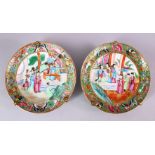 A PAIR OF 19TH CENTURY CHINESE CANTON FAMILLE ROSE PORCELAIN DEEP PLATES, each with scenes of