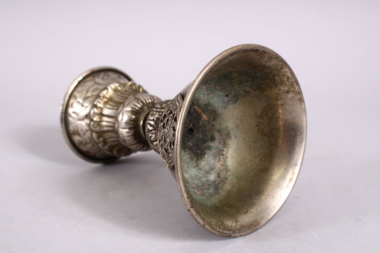 A GOOD 19TH CENTURY SINO TIBETAN WHITE METAL STEM CUP, with buddhistic object decoration, 11.5cm - Image 4 of 4