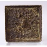 A GOOD 18TH / 19TH CENTURY CHINESE BRONZE MIRROR, of square form, moulded beast and vine decoration,
