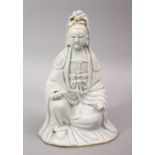 A 19TH CENTURY CHINESE BLANC DE CHINE PORCELAIN FIGURE OF GUANYIN, in a seated position holding a