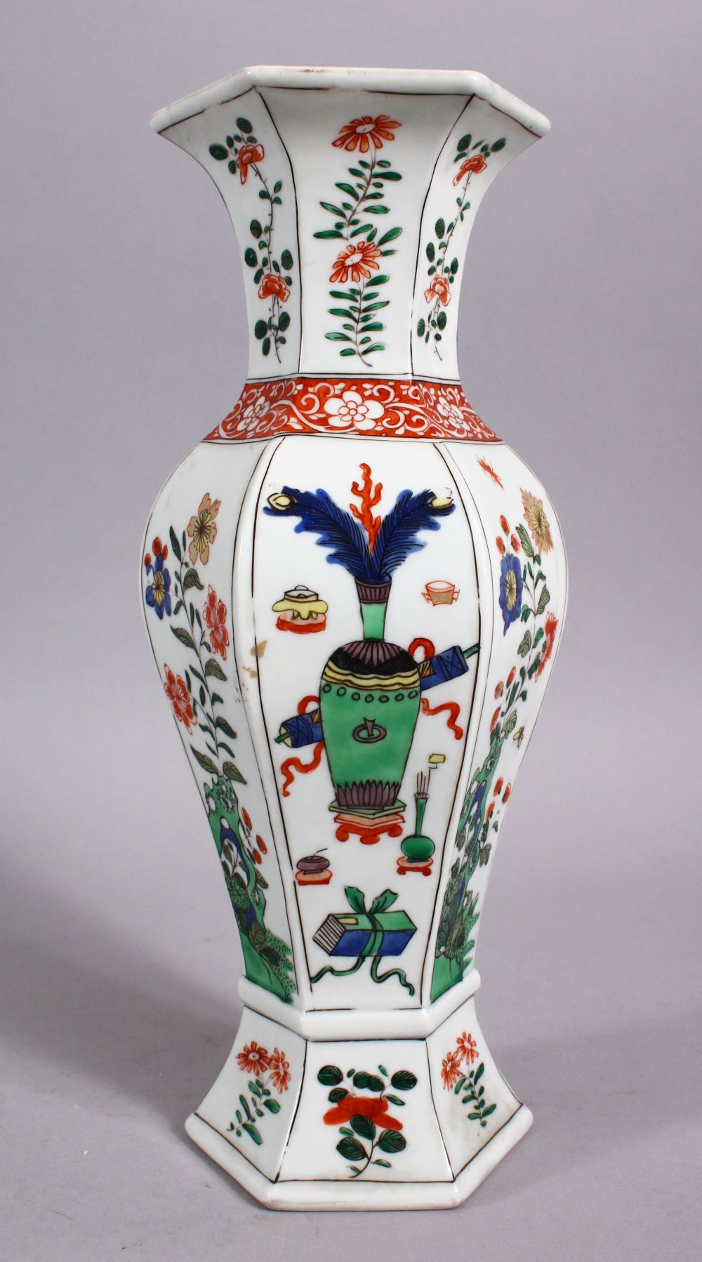 A CHINESE KANGXI STYLE FAMILLE VERTE HEXAGONAL FORM PORCELAIN VASE, decorated with displays of flora