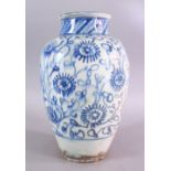A LARGE 18TH CENTURY PERSIAN SAFAVID BLUE & WHITE GLAZED POTTERY VASE, the vase decorated with