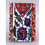 AN UNUSUAL RARE IZNIK POTTERY TILE, with decoration of floral motifs, 24cm x 16cm