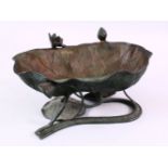 A CHINESE BRONZE LOTUS LEAF FORMED BOWL / ORNAMENT, depicting a lotus leav inverted with shoots of