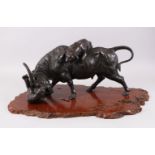A LARGE AND HEAVY JAPANESE MEIJI PERIOD BRONZE OXEN & TIGER GROUP, the artist has captured in
