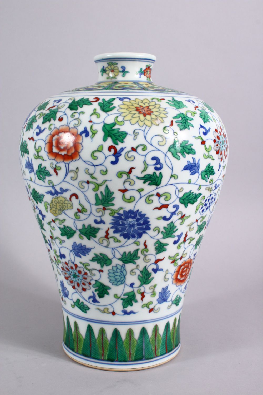 A CHINESE DOUCAI DECORATED PORCELAIN MEIPING VASE, decorated with formal scrolling lotus, and lappet - Image 5 of 9
