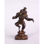A 17TH / 18TH CENTURY SOUTH INDIAN BRONZE FIGURE OF BABY KRISHNA , 7cm high.