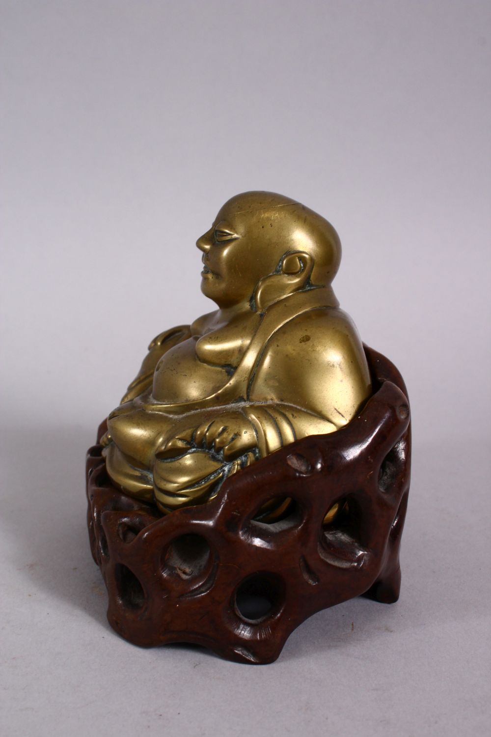 A 19TH CENTURY CHINESE BRONZE FIGURE OF BUDDHA & STAND, seated with his hand upon his knee, in a - Image 2 of 6