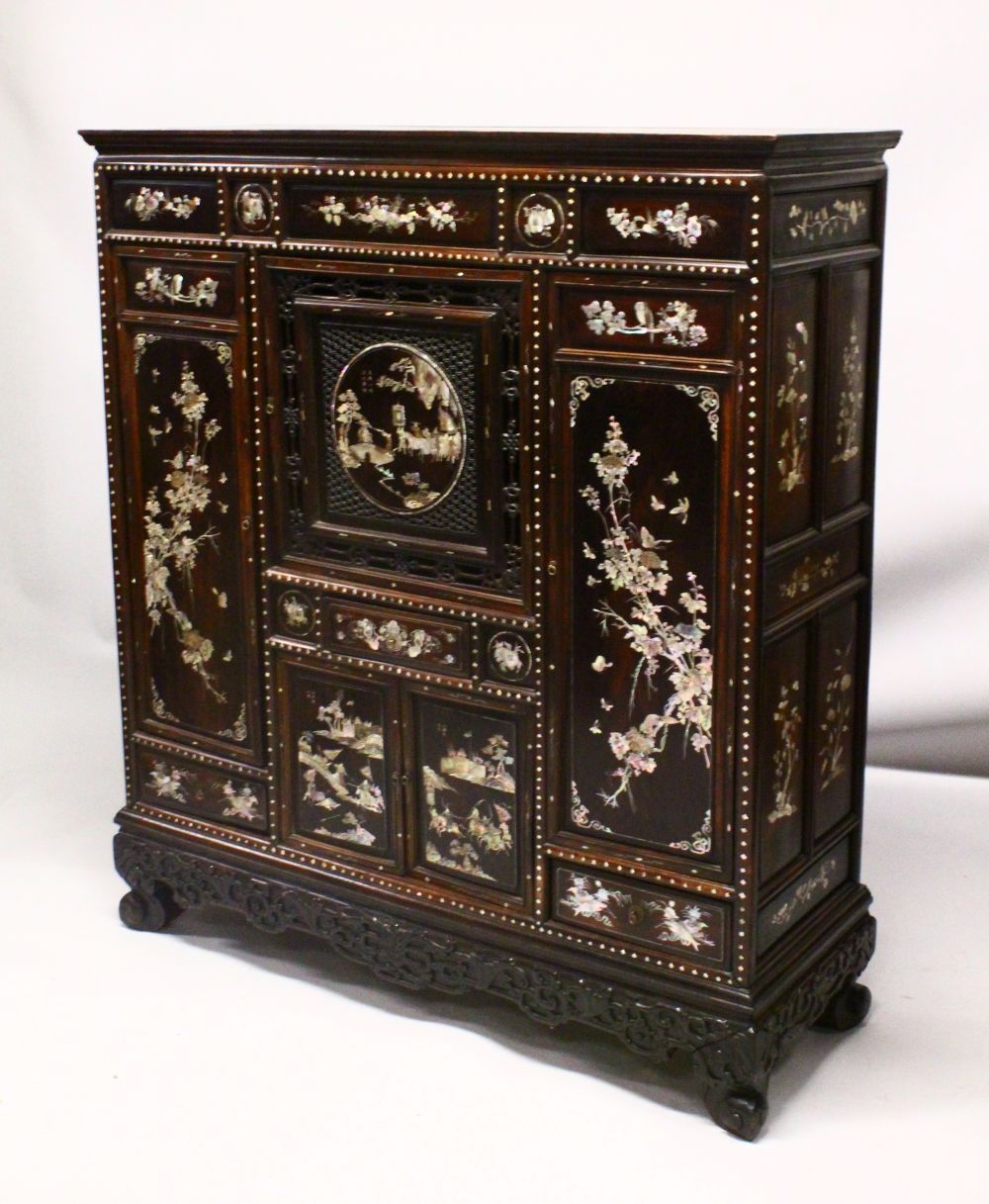 A 20TH CENTURY ROYAL VIETNAM INLAID AND SIGNED MOTHER OF PEARL CABINET, the cabinet with 9 panels of