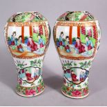 A PAIR OF 19TH CENTURY CHINESE FAMILLE ROSE CANTON PORCELAIN MEIPING VASES, each decorated with