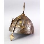 A 19TH CENTURY INDO PERSIAN GOLD & SILVER INLAID STEEL HELMET, decorated with carved formal floral