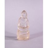 A 19TH CENTURY THAI CARVED ROCK CRYSTAL FIGURE OF SEATED BUDDHA, 5.2cm high.