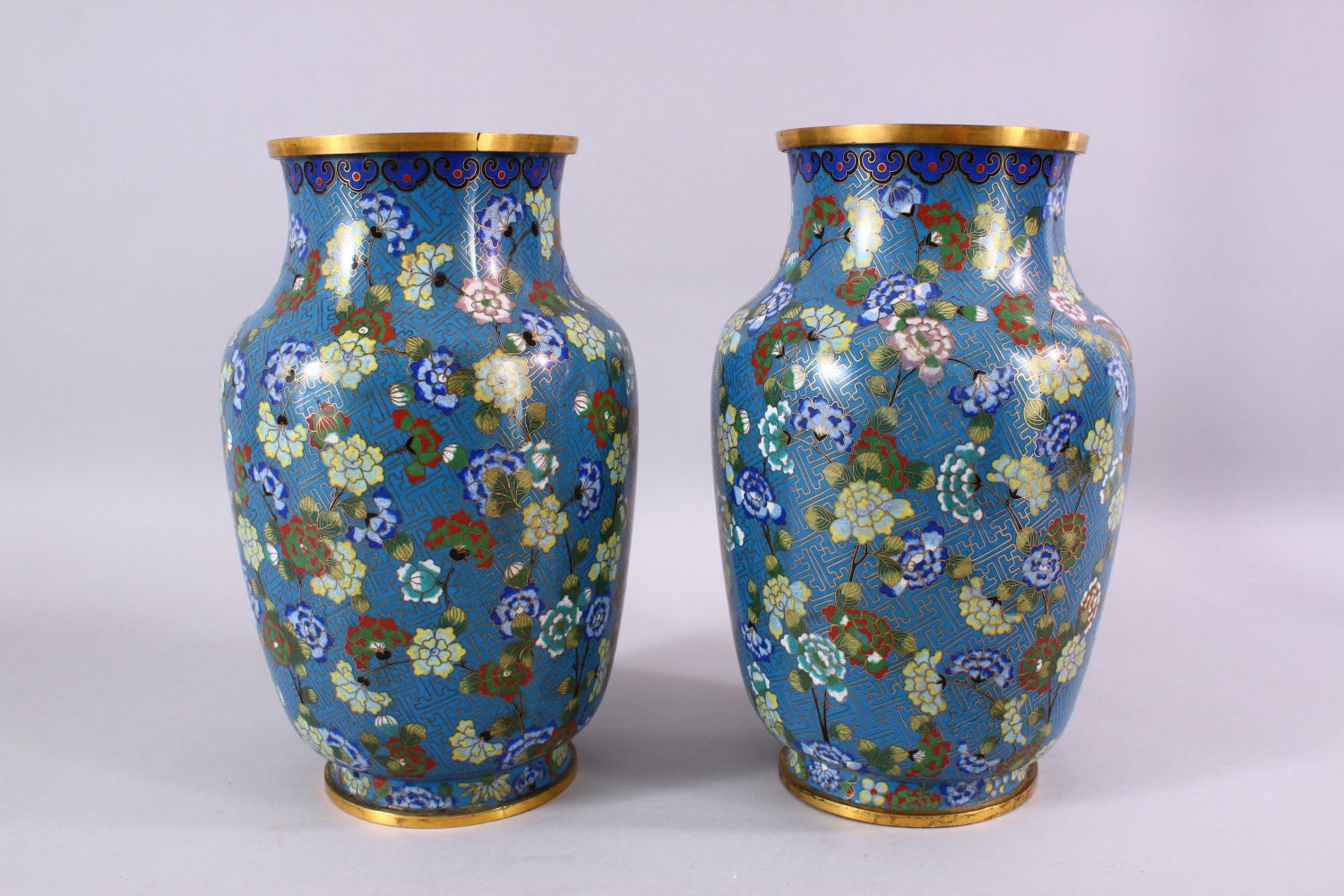 A LARGE PAIR OF 19TH / 20TH CENTURY CHINESE CLOISONNE VASES, each decorate with an array of flora - Image 5 of 6