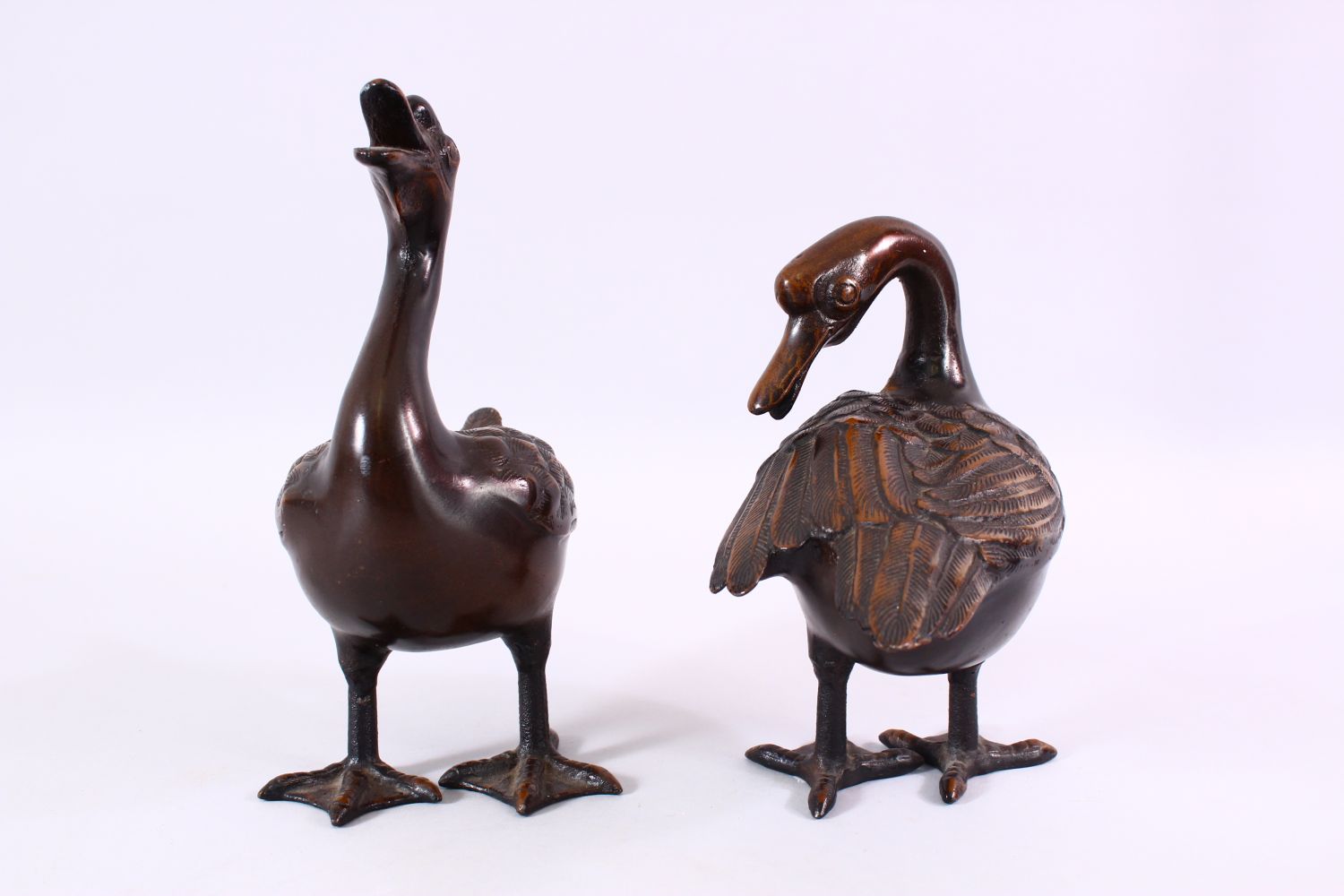 A PAIR OF CHINESE BRONZE FIGURES OF DUCKS, both in standing positions with detailed carvings of - Image 6 of 7