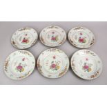 A SET OF SIX CHINESE 18TH CENTURY FAMILLE ROSE PLATES, each with floral decoration, 22.5cm.