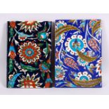 TWO IZNIK POTTERY TILES, each decorated with floral motif decoration, 23.5cm x 16cm & 24cm x 16.5cm