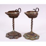 A PAIR OF 19TH CENTURY ISLAMIC KASHMIRI ENAMEL CANDLESTICKS, formed as pourers, with openwork bases,