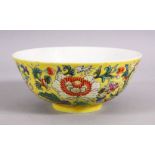 A CHINESE FAMILLE JAUNE PORCELAIN BOWL - decorated with a yellow ground and an array of native