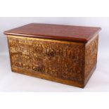 A LARGE 19TH CENTURY BURMESE LACQUERED WOODEN CHEST, with brass embossed decorated onlaid panels