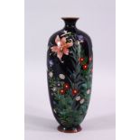 A JAPANESE MEIJI PERIOD SILVER WIRE CLOISIONNE VASE, decorated with a native display of flora,