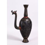 A 19TH / 20TH CENTURY CARVED JADE HUQQA BASE, carved with floral decoration, the spout carved as a