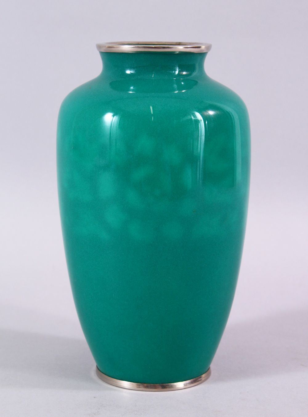 A JAPANESE TAISHO PERIOD CLOISONNE VASE, with a turquoise ground with plated mounts, with softly