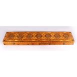 A FINE QUALITY 19TH CENTURY DAMASCUS MULTI INLAID EXOTIC WOOD SWORD / SCIMITAR BOX, inlaid with an