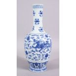 A CHINESE MING STYLE BLUE & WHITE PORCELAIN DRAGON VASE, decorated with two dragons amongst lotus,