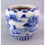 A 19TH CENTURY CHINESE BLUE & WHITE PORCELAIN JAR / JARDINIERE, decorated with views of buildings in