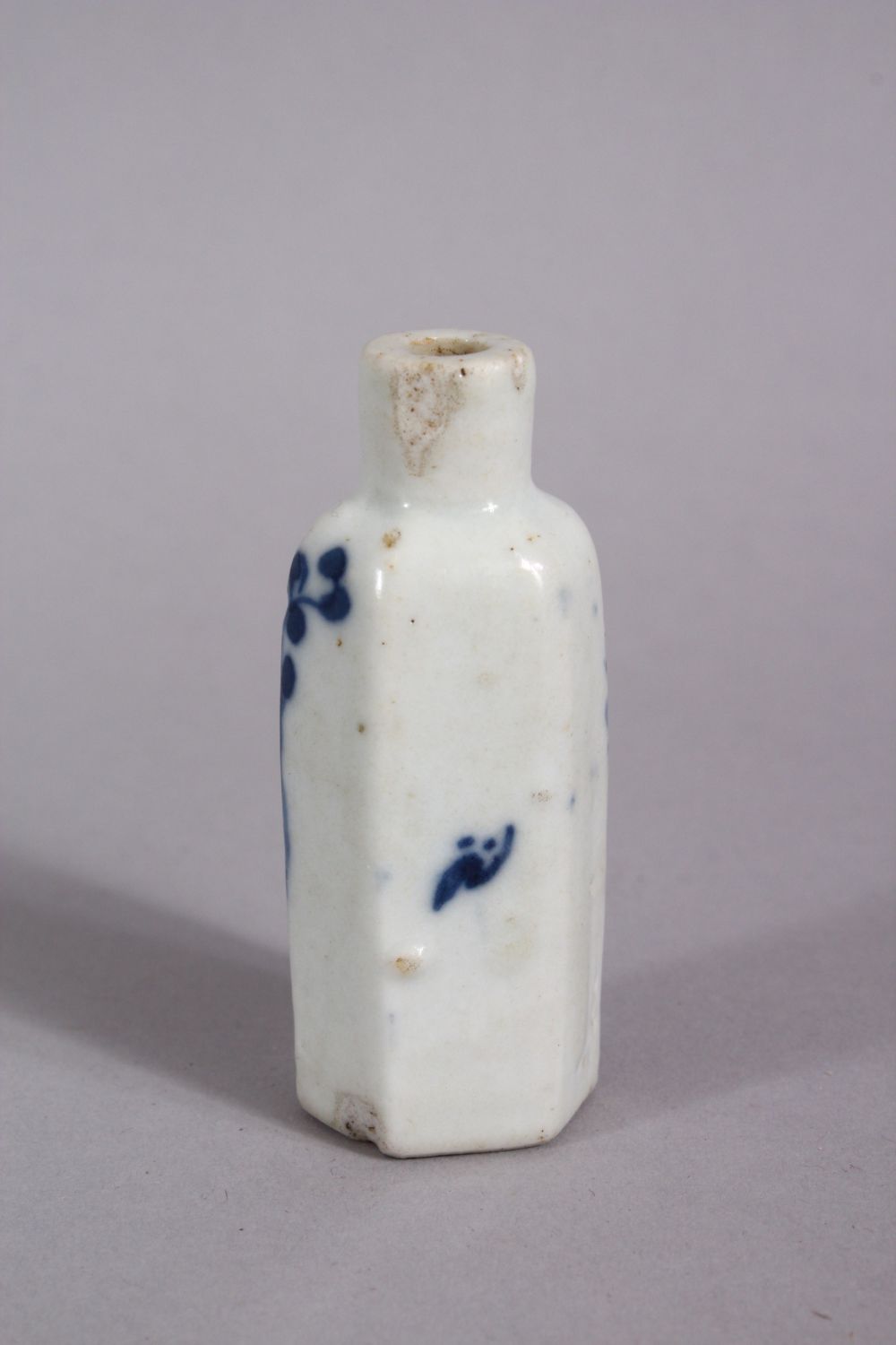 A CHINESE BLUE & WHITE PORCELAIN HEXAONAL FORM SNUFF BOTTLE, decorated with a figure in a garden, - Image 2 of 4
