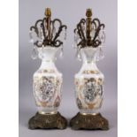 A 19TH CENTURY PAIR OF OPALINE GLASS GILT CHANDELIER TABLE LAMPS, with gilt floral motif