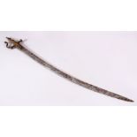 A 19TH CENTURY ISLAMIC INDIAN TULWAR SWORD, the hilt with carved floral decoration, 95cm