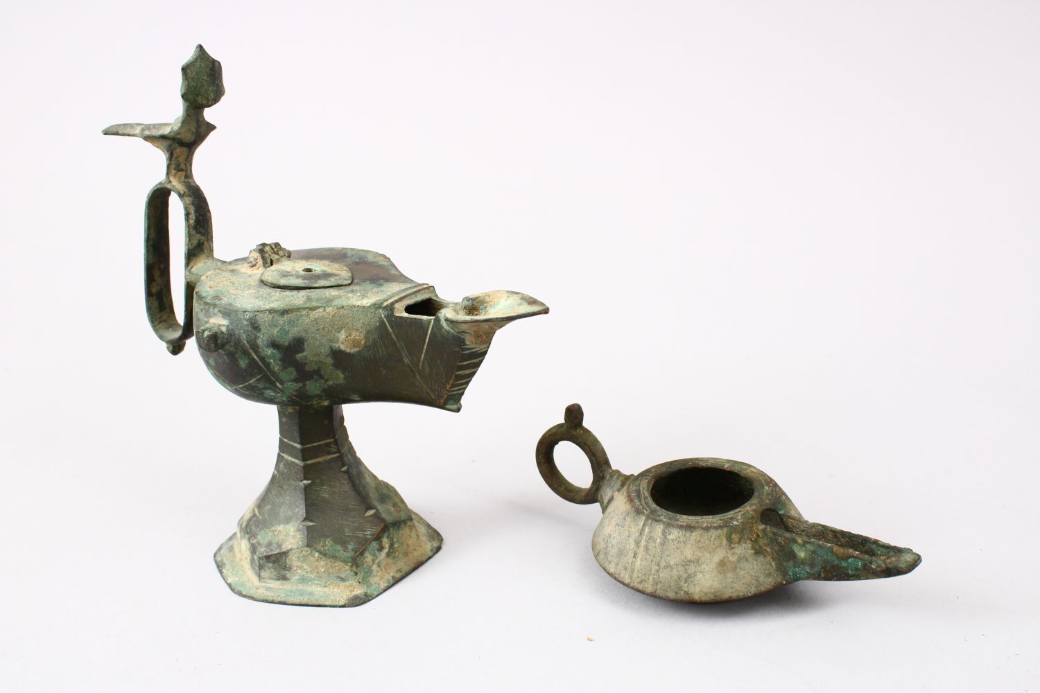 A COLLECTION OF FOUR INDIAN & PERSIAN OIL LAMPS AND A 12TH CENTURY INKWELL (4) - Image 5 of 5