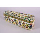 AN OTTOMAN KUTAHYA POTTERY PEN BOX, decorated with floral motif and borders, 27cm wide x 7cm wide