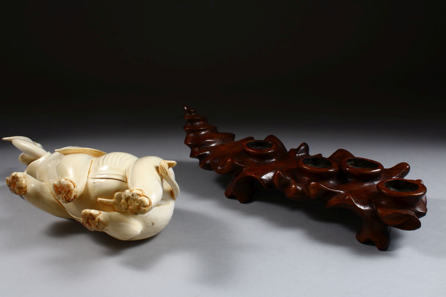 A 19TH CENTURY CHINESE CARVED IVORY FIGURE OF AN ELEPHANT, the elephant holding on to the horn of - Image 9 of 9