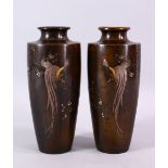 A PAIR OF JAPANESE MEIJI PERIOD BRONZE & MIXED METAL COCKEREL VASES, the mirrored pair of vases