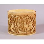 A JAPANESE MEIJI PERIOD CARVED IVORY SECTION, carved with cranes and birds amongst bamboo, 8.5cm