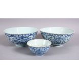 A LOT OF THREE 19TH CENTURY CHINESE BLUE & WHITE PORCELAIN BOWLS, each decorated with formal