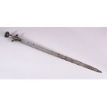 AN UNUSUAL 19TH / 19TH MUGHAL INDIAN TULWAR SWORD WITH SILVER INLAID HANDLE. 86cm.