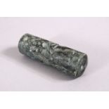 A SUMERIAN STYLE CYLINDER ROLLING SEAL, with intaglio style decoration, 6cm