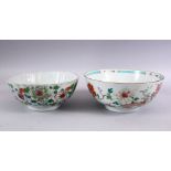 TWO 18TH CENTURY CHINESE PORCELAIN FAMILLE ROSE BOWLS,the smaller with a ribbed body decorated