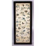 A 19TH CENTURY CHINESE EMBROIDERED SILK FRAMED PANEL, finely embroidered with scenes of