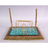 A PERSIAN MICRO MOSAIC & ENAMEL DESK STAND, with enamel decoration depicting flora upon turquoise