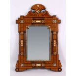 A 19TH CENTURY ISLAMIC MOORISH INLAID WOOD AND IVORY MIRROR - the frame inlaid with an array of