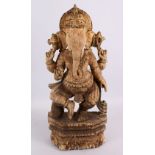 AN 19TH / 20TH CENTURY INDIAN CARVED FIGURE OF GANESH / DEITY - 59cm high